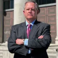 John G. (Trae) Sims III